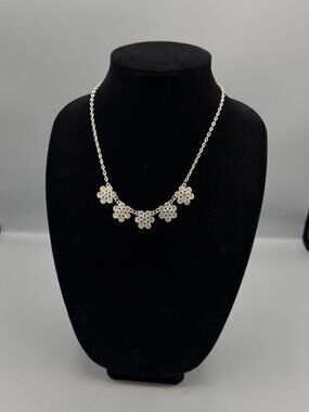 Silver colored flower gem necklace